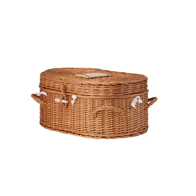 Memoria wicker coffin for animals with white trim and cushion TheWickerStories