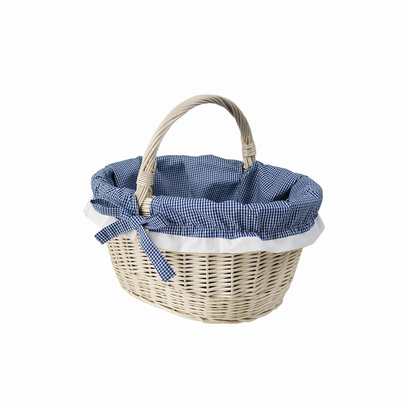 Walerissa wicker shopping basket with navy trim and handle TheWickerStories