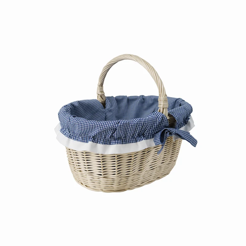 Walerissa wicker shopping basket with navy trim and handle TheWickerStories
