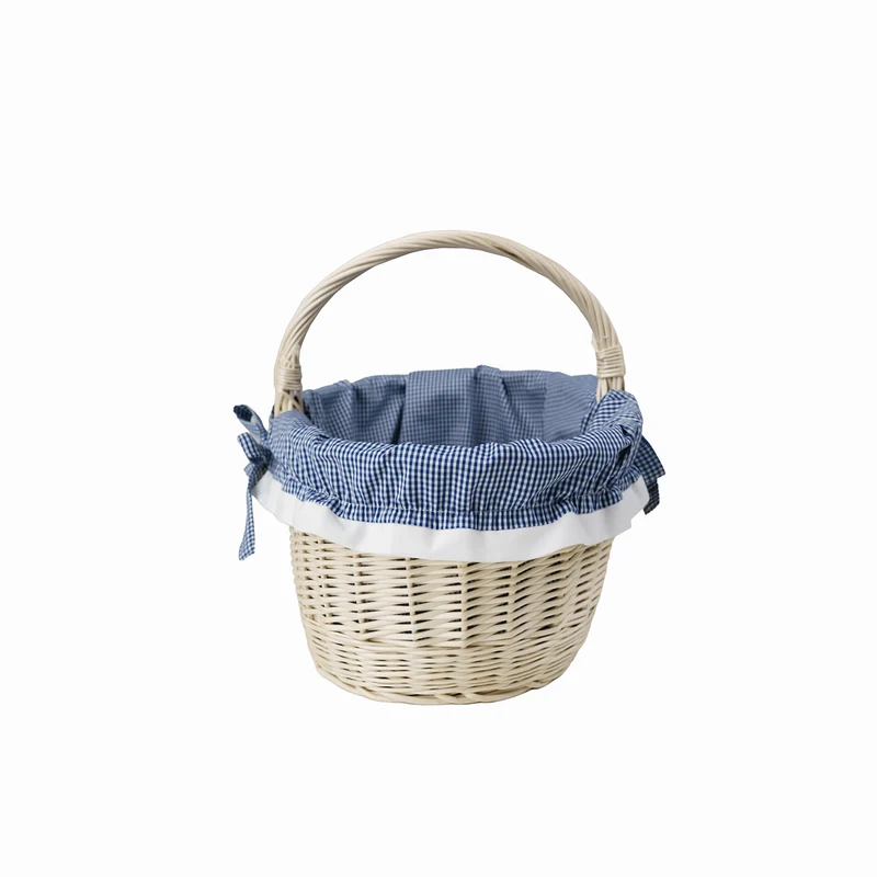 Walerissa wicker shopping basket with navy trim and handle TheWickerStories