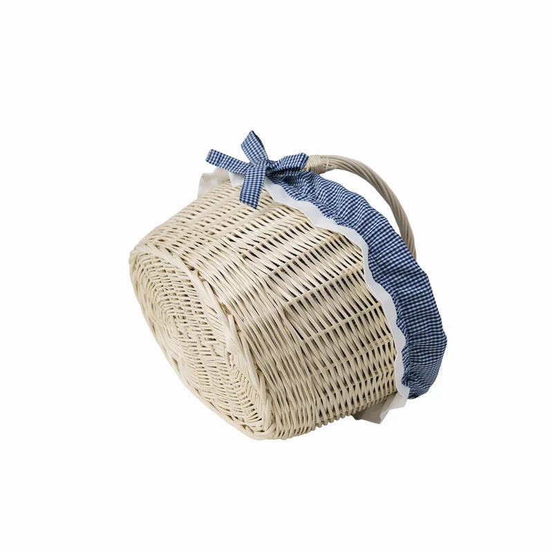 Walerissa wicker shopping basket with navy trim and handle TheWickerStories