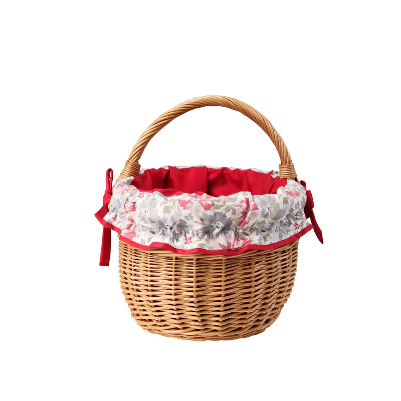 Werburga handmade wicker shopping basket with red trim and handle TheWickerStories