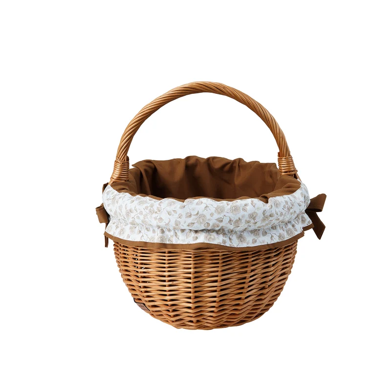 Werburga wicker shopping basket with brown trim and handle by TheWickerStories