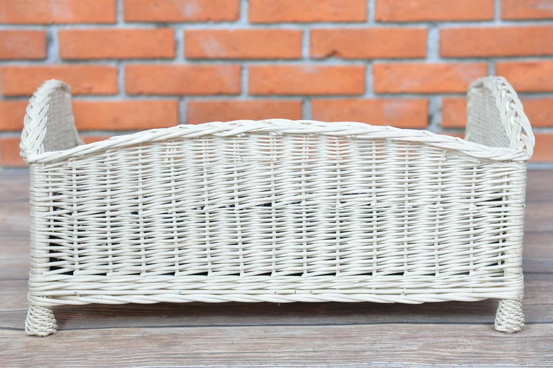 Erivia wicker pet basket for dogs and cats with cushion and low entrance TheWickerStories