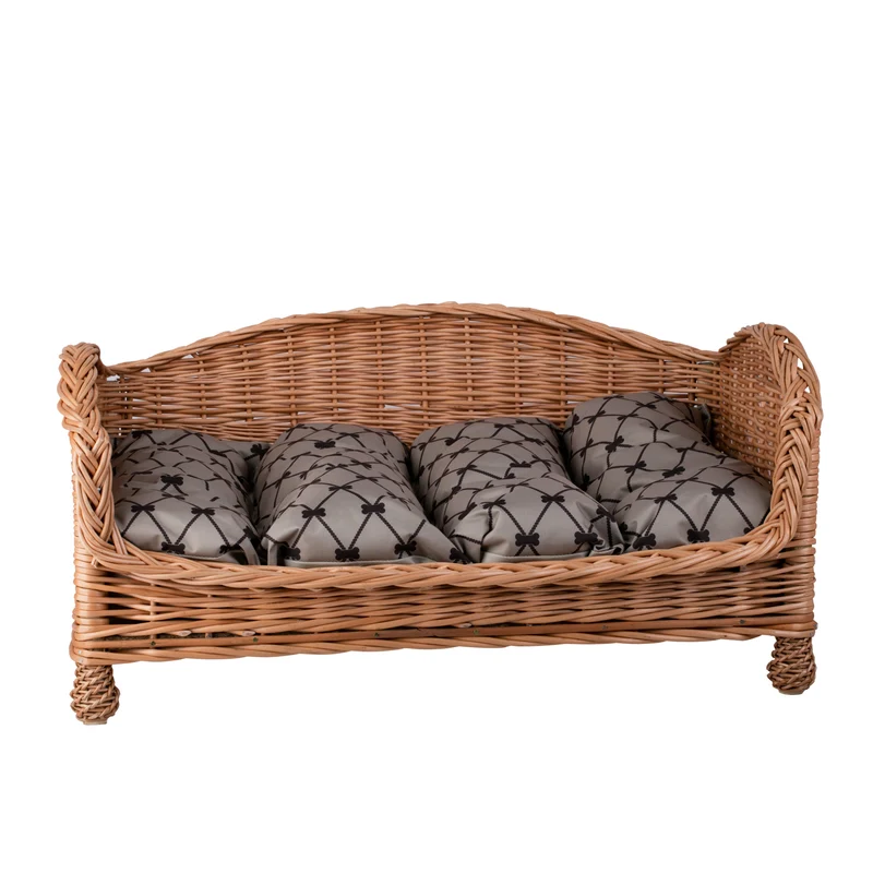 Erivia wicker pet bed for dog and cat with beige cushion and lowered entrance TheWickerStories