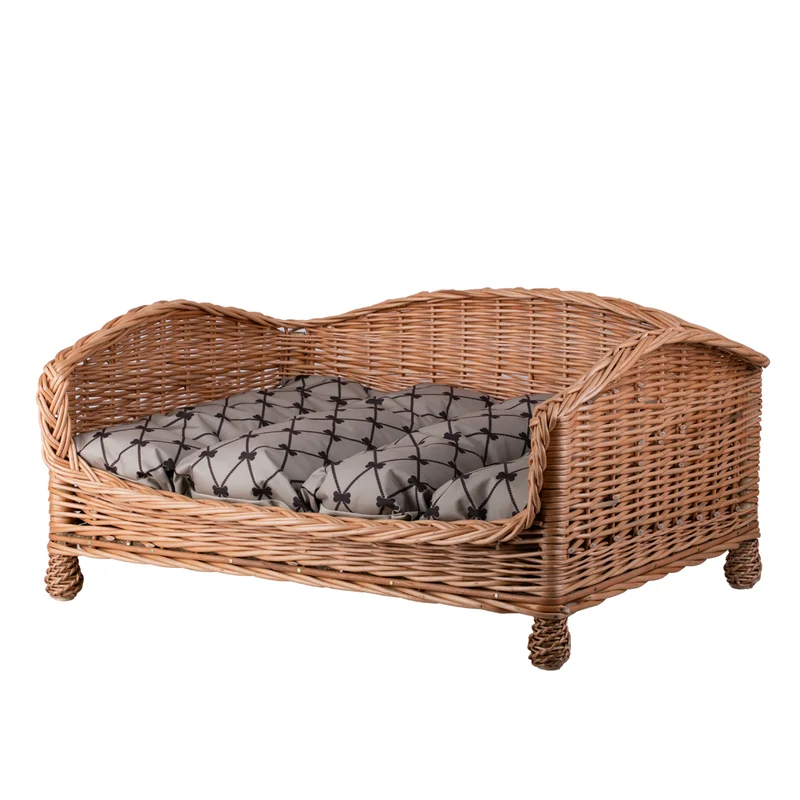 Erivia wicker pet bed for dog and cat with beige cushion and lowered entrance TheWickerStories