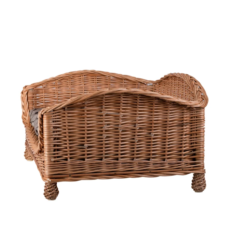 Erivia wicker pet bed for dog and cat with beige cushion and lowered entrance TheWickerStories