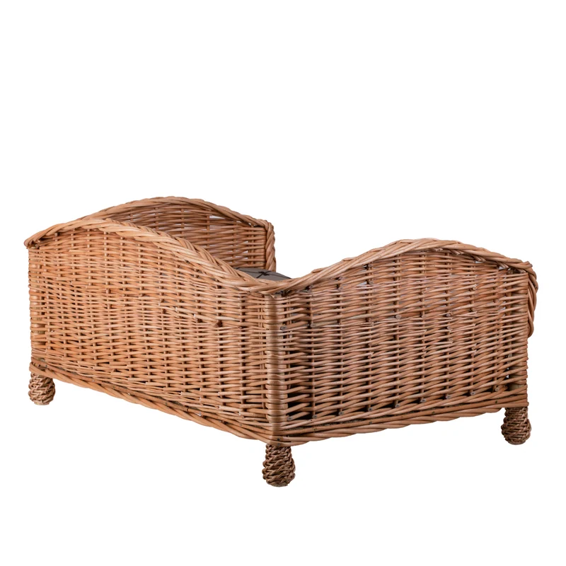 Erivia wicker pet bed for dog and cat with beige cushion and lowered entrance TheWickerStories