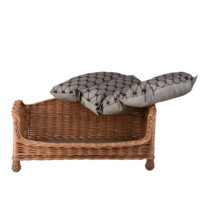 Erivia wicker pet bed for dog and cat with beige cushion and lowered entrance TheWickerStories