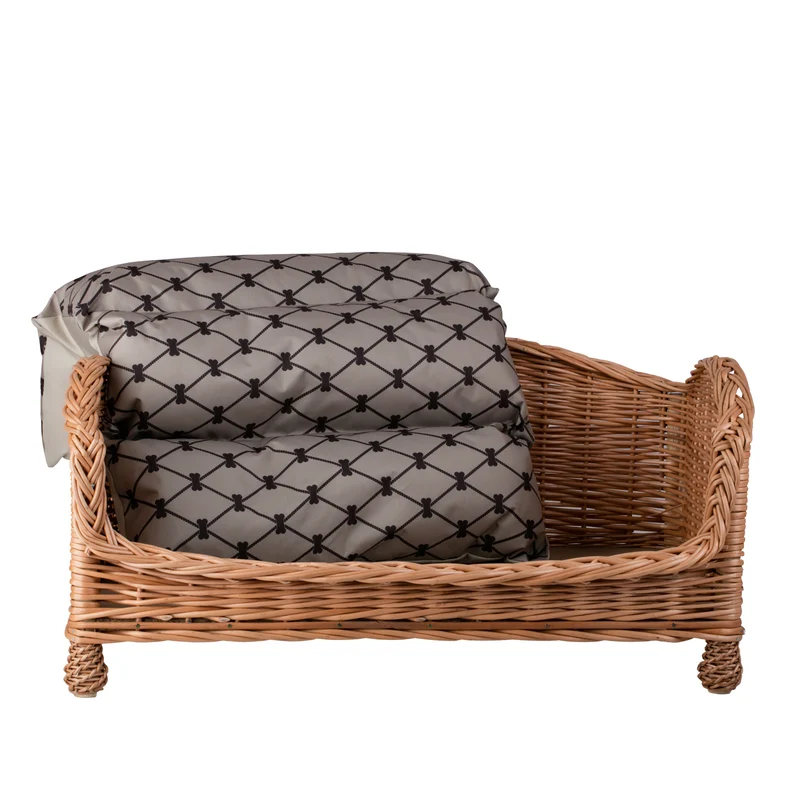 Erivia wicker pet bed for dog and cat with beige cushion and lowered entrance TheWickerStories