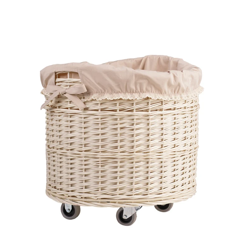 Caros large, round, mobile storage basket, wicker display basket with trim TheWickerStories