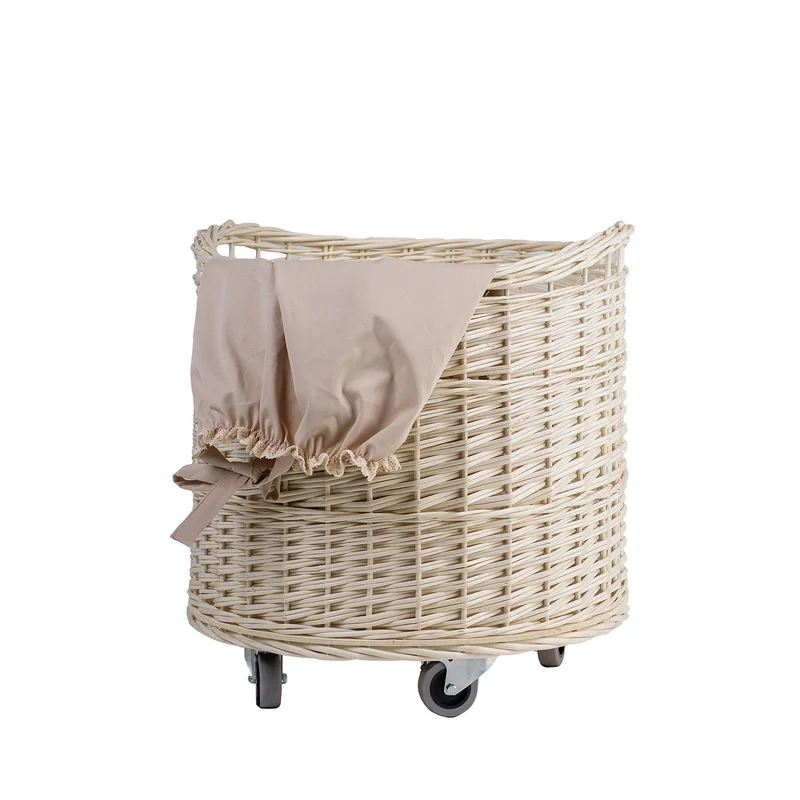 Caros large, round, mobile storage basket, wicker display basket with trim TheWickerStories