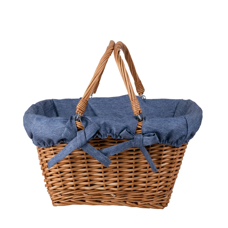 Wulfhildis shopping basket with a wicker handle and blue trim TheWickerStories