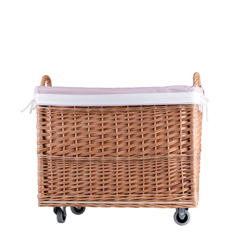 Salux wicker basket with pink lining and wheels TheWickerStories