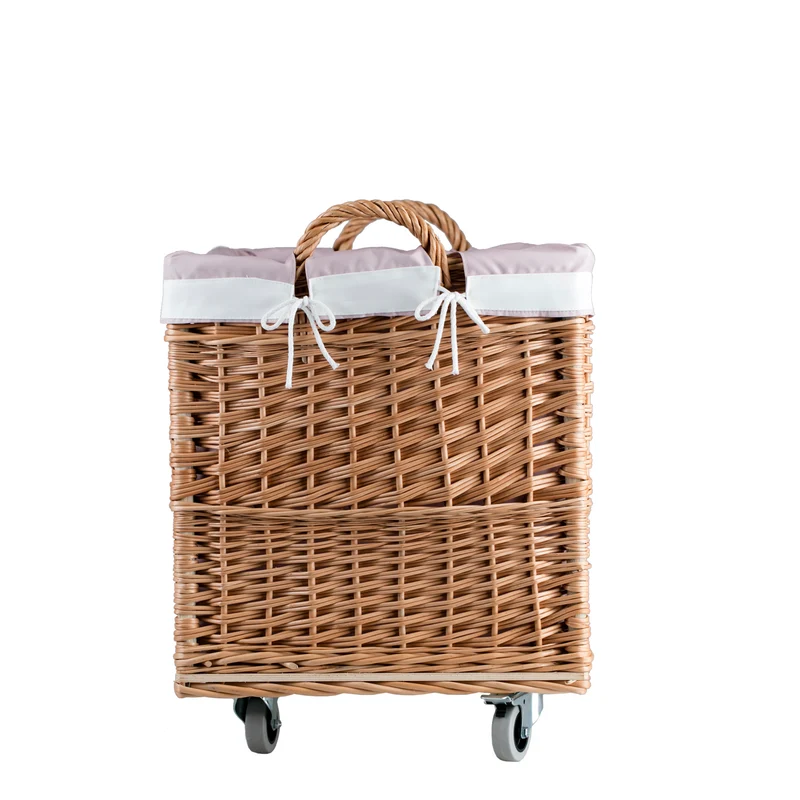 Salux wicker basket with pink lining and wheels TheWickerStories