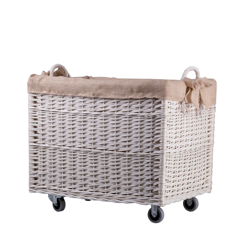 Salux wicker firewood basket with jute trim, handles and wheels TheWickerStories