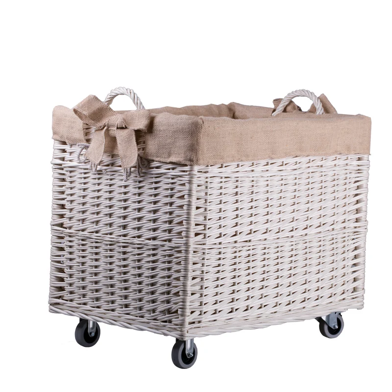 Salux wicker firewood basket with jute trim, handles and wheels TheWickerStories