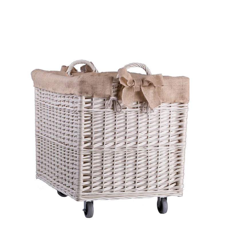 Salux wicker firewood basket with jute trim, handles and wheels TheWickerStories