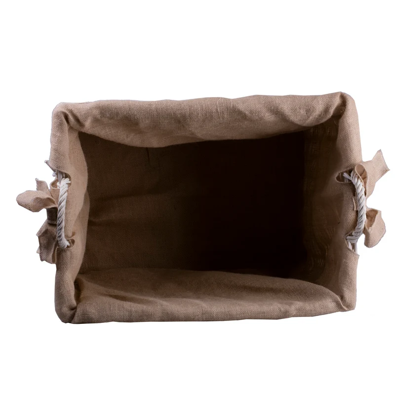 Salux wicker firewood basket with jute trim, handles and wheels TheWickerStories