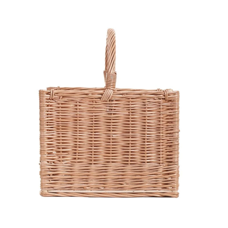 Feloria wicker firewood basket with handle and lowered front TheWickerStories