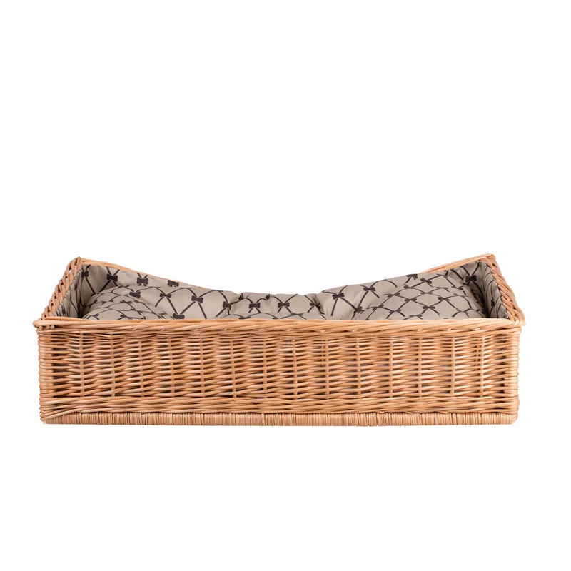 Eris wicker basket-bed for dogs and cats with beige trim, cushion and lowered entry TheWickerStories