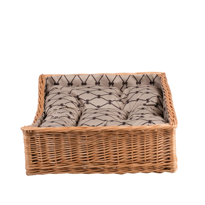 Eris wicker basket-bed for dogs and cats with beige trim, cushion and lowered entry TheWickerStories