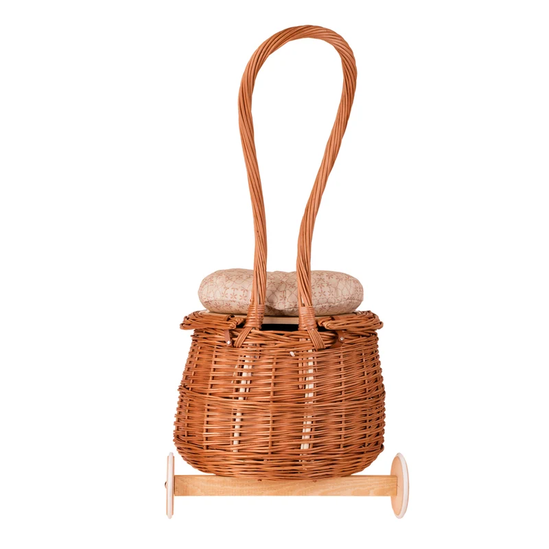 Salix wicker storage pouf with beige trim, cushion and caster wheels TheWickerStories