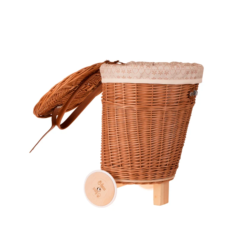 Celtis wicker basket on wheels with cream trim and straps TheWickerStories