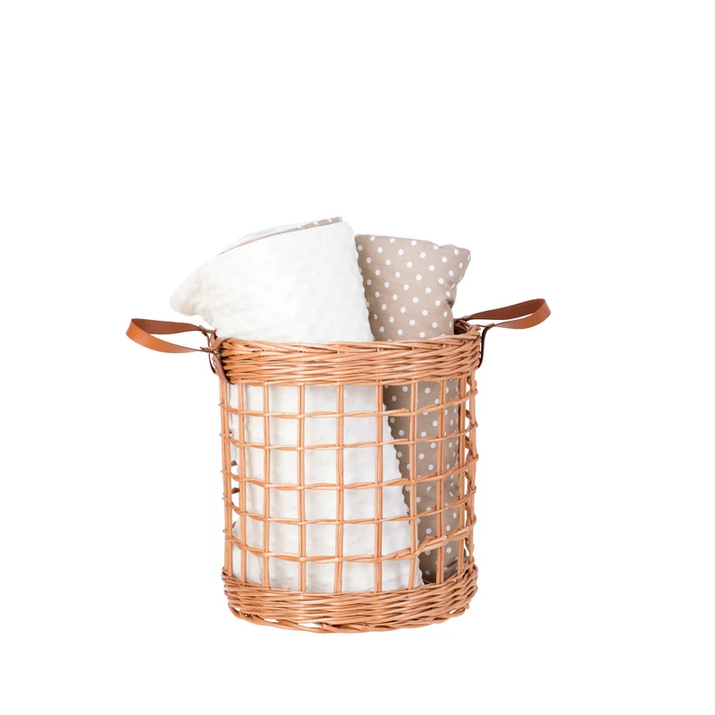 Neloria wicker storage basket for towels and toys, with leather handles TheWickerStories