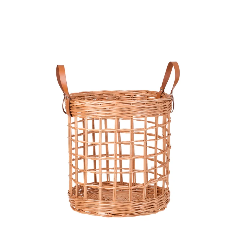 Neloria wicker storage basket for towels and toys, with leather handles TheWickerStories