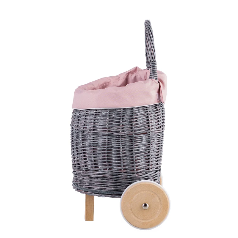 Luke wicker push-along doll pram with pink trim, handle and wooden wheels TheWickerStories