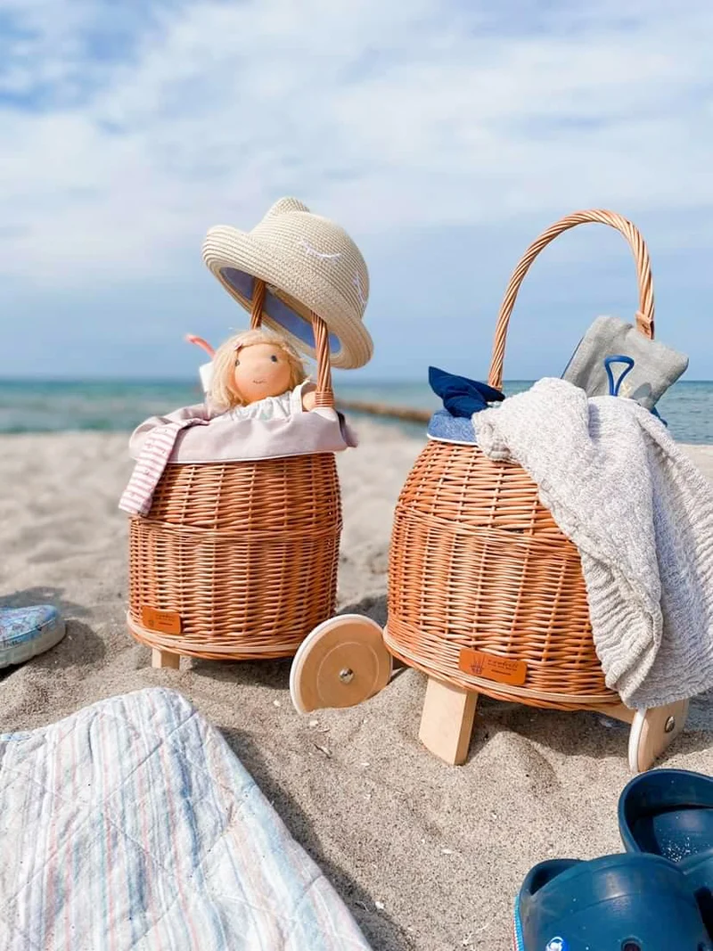 Luke wicker push walker for children with blue trim, with handle and wooden wheels TheWickerStories