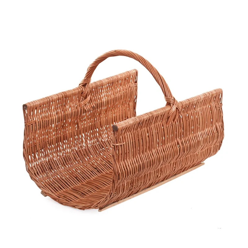 Fano wicker firewood basket with handle on wooden runners TheWickerStories