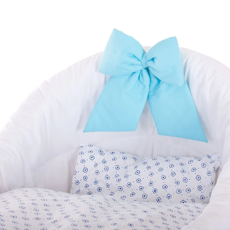 Papilio wicker bassinet for infants with white trim and light blue accents, with canopy, blanket and pillow, on wheels with brake TheWickerStories