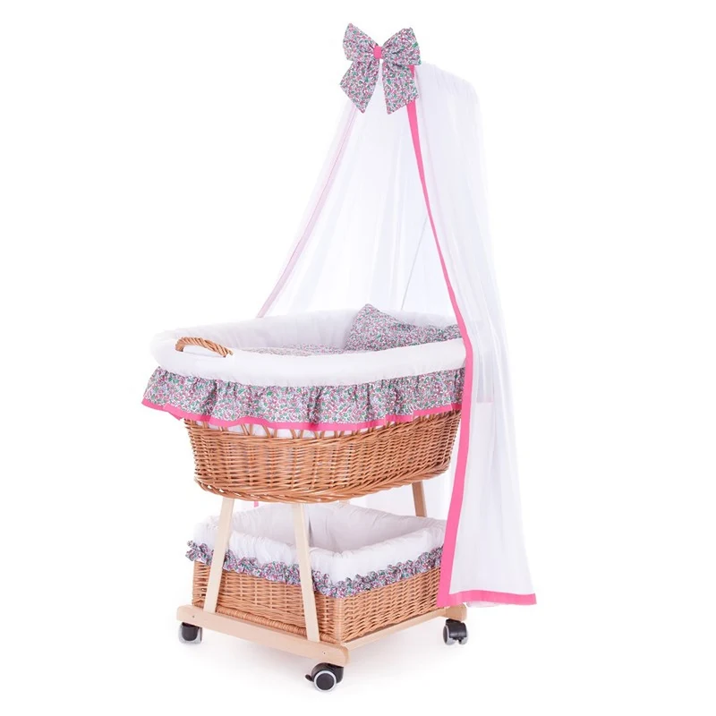 Papilio wicker baby cradle with pink trim, canopy, pillow and quilt TheWickerStories