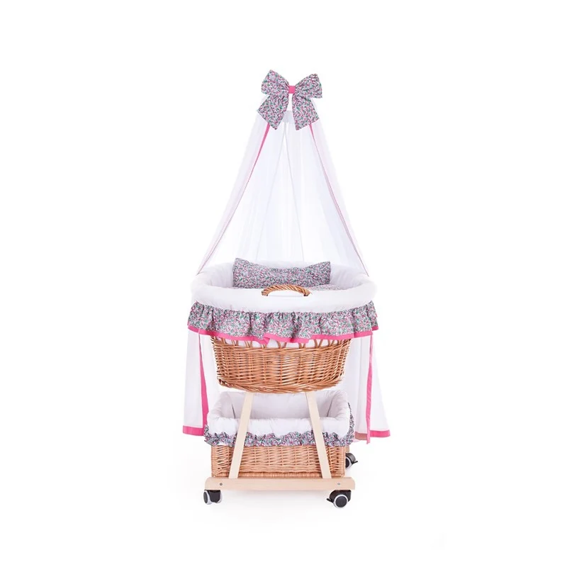 Papilio wicker baby cradle with pink trim, canopy, pillow and quilt TheWickerStories