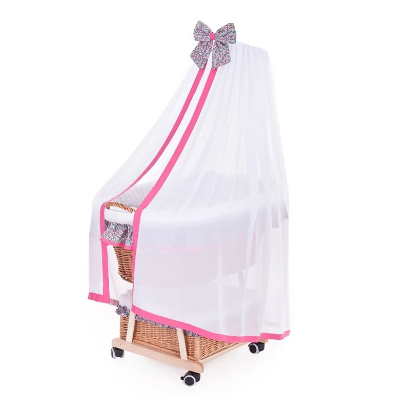 Papilio wicker baby cradle with pink trim, canopy, pillow and quilt TheWickerStories