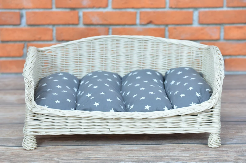 Erivia wicker pet bed for dogs and cats with a soft cushion TheWickerStories