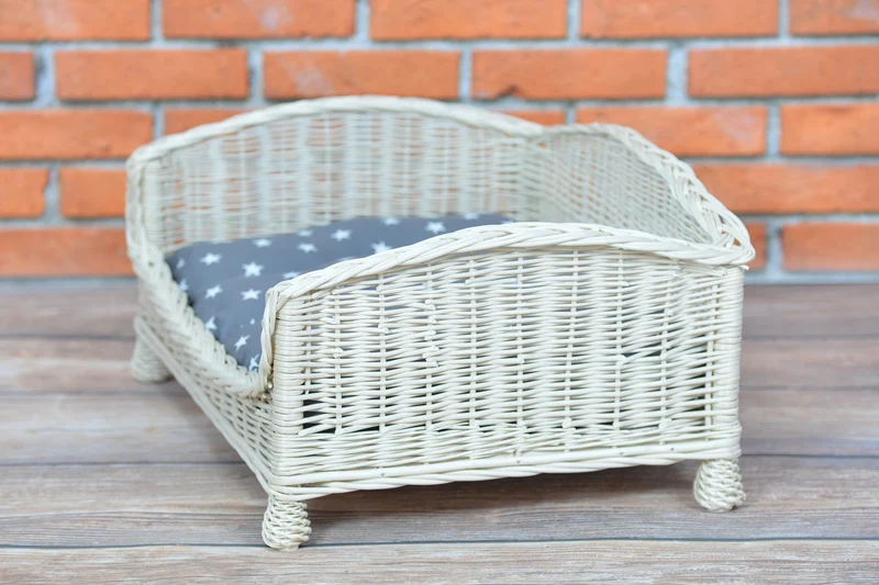 Erivia wicker pet bed for dogs and cats with a soft cushion TheWickerStories