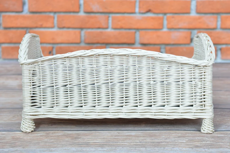 Erivia wicker pet bed for dogs and cats with a soft cushion TheWickerStories