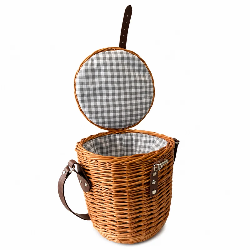 Rivora wicker shoulder basket with fabric lining, lid, and leather strap TheWickerStories