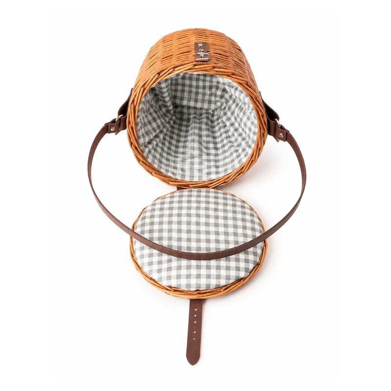 Rivora wicker shoulder basket with fabric lining, lid, and leather strap TheWickerStories
