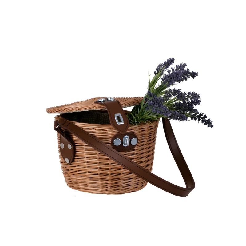 Rivora wicker shoulder bag with lid and leather strap TheWickerStories