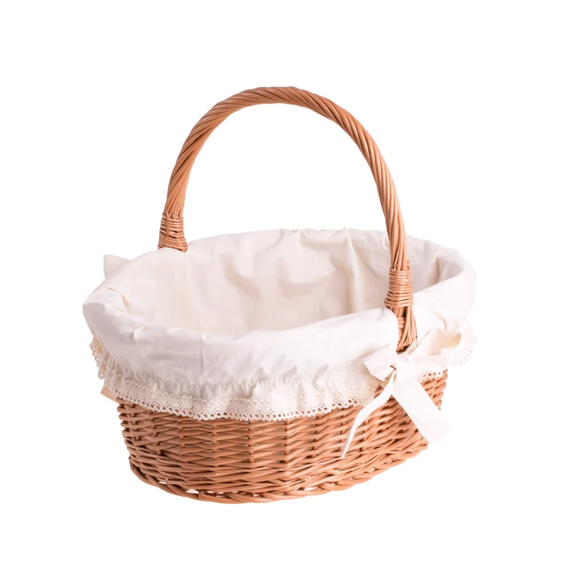 Zelora wicker gift basket with cream trim and handle TheWickerStories