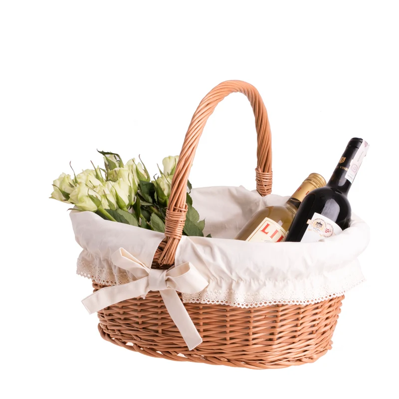 Zelora wicker gift basket with cream trim and handle TheWickerStories