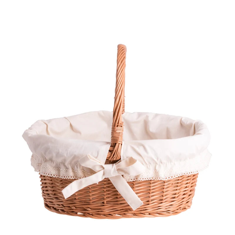Zelora wicker gift basket with cream trim and handle TheWickerStories