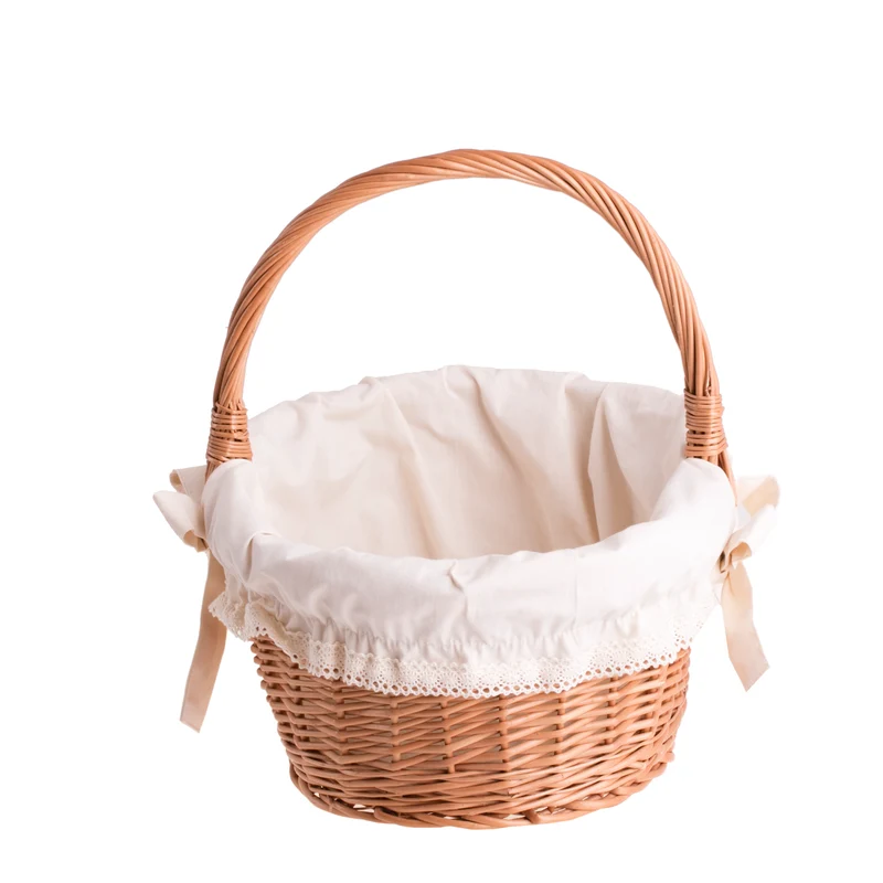 Zelora wicker gift basket with cream trim and handle TheWickerStories