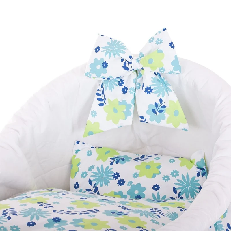 Papilio wicker baby bassinet with white trim, canopy, duvet and pillow, on wheels with brake TheWickerStories