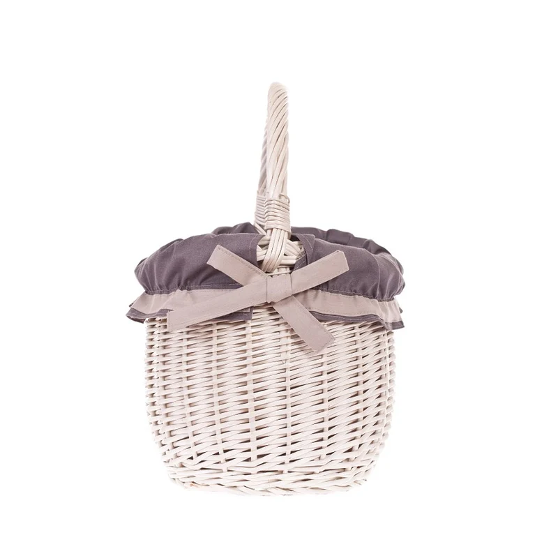 Wavellia wicker shopping basket with gray trim and handle TheWickerStories