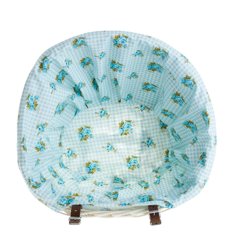 Paulus wicker bicycle basket with blue trim, featuring handlebar straps TheWickerStories